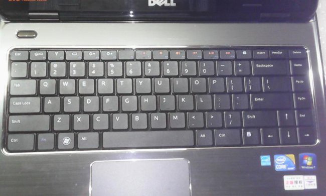 win7笔记本键盘u变成4怎么改回来