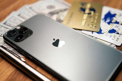 苹果手机更新中可以停止吗 具体设置方法