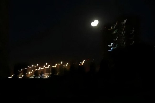 拍月亮手机专业模式怎么设置